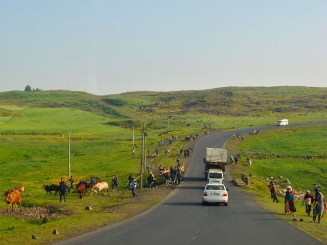 People walking to the market along the road from Addis Ababa to Bahir Dar, Ethiopia
