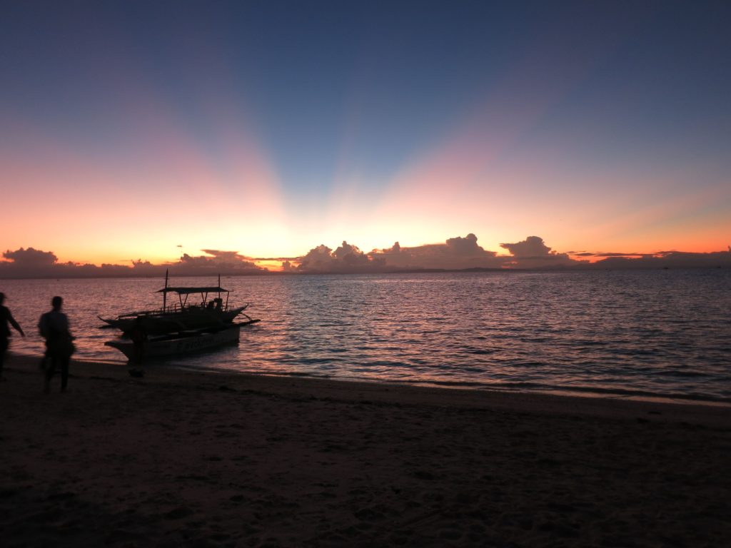Sunrise at Malapascua beach departing for thresher shark dive