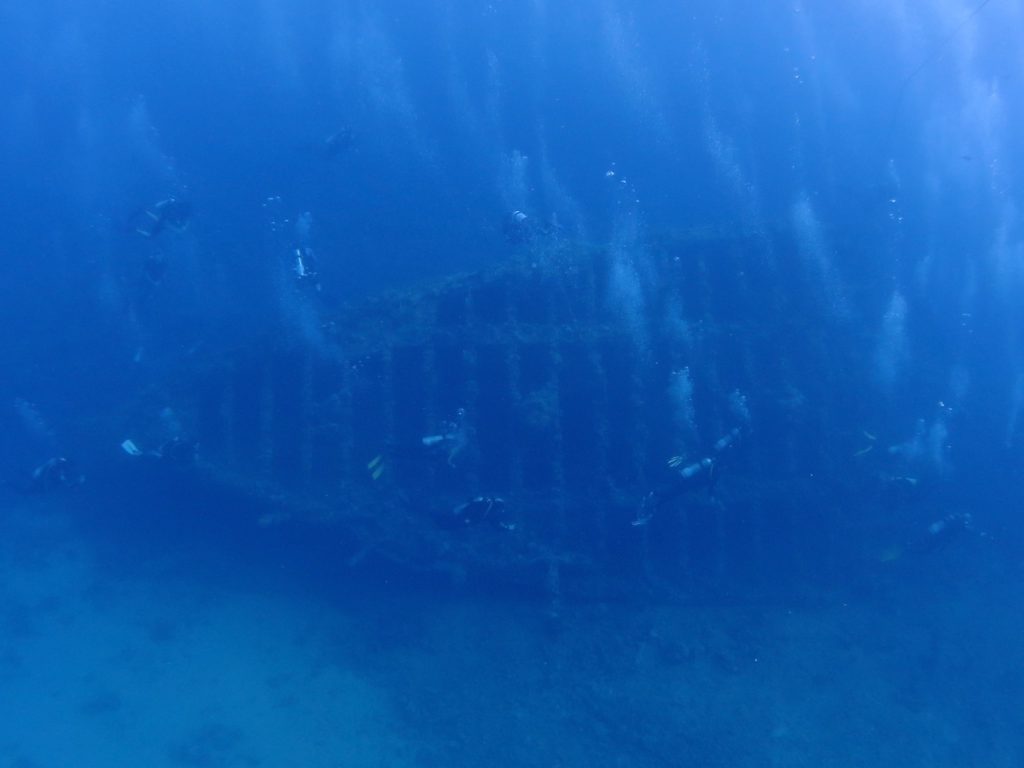 Carnatic wreck with divers, Red Sea, Egypt
