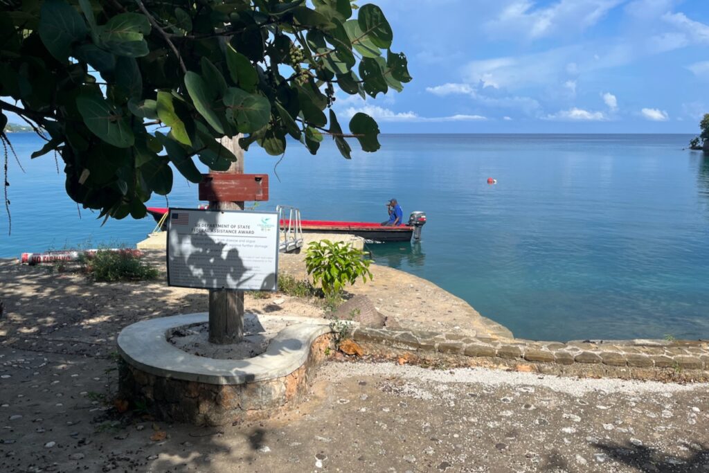 Boat waiting fro divers at James Bond beach in Oracabessa, Jamaica