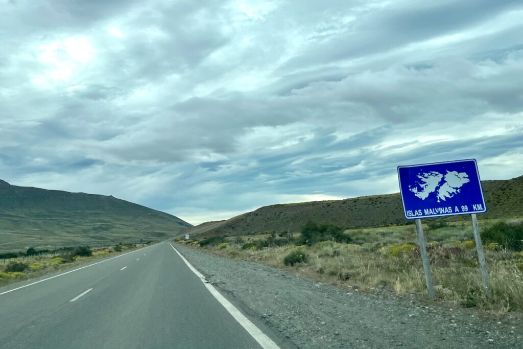 Driving out of El Chalten to El Calafate and Malvinas sign, Argentina