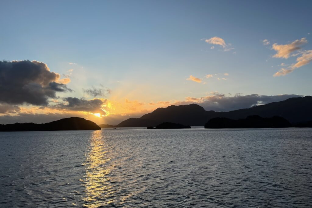 Sunset while sailing on Kaweskar route with Skorpios cruise, Chile