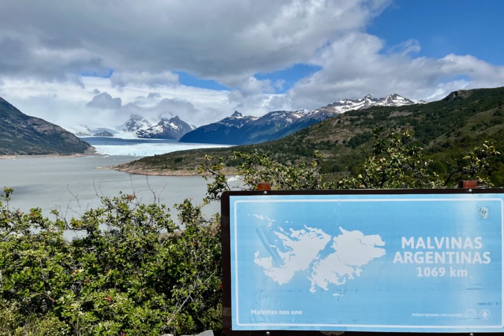 View of Perito Moreno Glacier and Malvinas Argentinas sign, Argentina