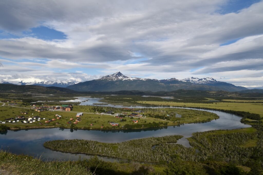 The view of Rio Serrano hotel area and Torres del Paine range, Chile
